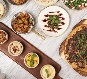 Fruit & Walnut Salad (Fresh Fruits chopped with Fresh mint and Walnuts served with Raisins and Fresh lime Juice and Black salt)