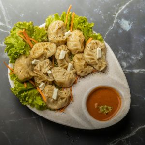 Cabbage Momos (Veggies and Panner served inside a slice of Cabage)