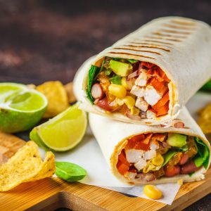 California Burrito (Garlic Grilled Chicken, Tofu, or Paneer with Pinto Beans, Cheese, and Cabbage Sour Cream in your choice of Cabbage or Wheat Wrap)