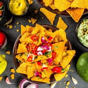 Munchy Crunchy Nachos Salad (Boiled Chickpeas and Kidney beans served with lots of salet with Greek yoghurt and Raw mango Pudina Chutney served Nachos)